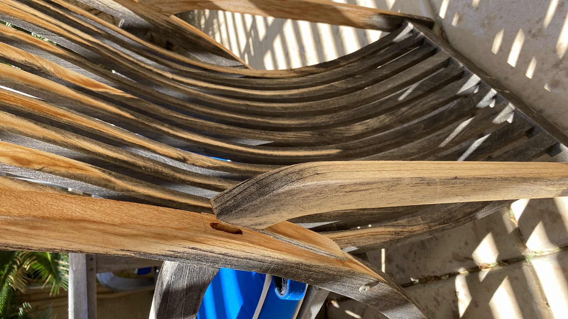 Photo 1 of TEAK WAREHOUSE DINING SET WITH 4 CHAIRS MARINE BLUE WATER REPELLANT AND SUN PROTECTION FABRIC AND POTTED PLANT - TABLE 43” H29” 