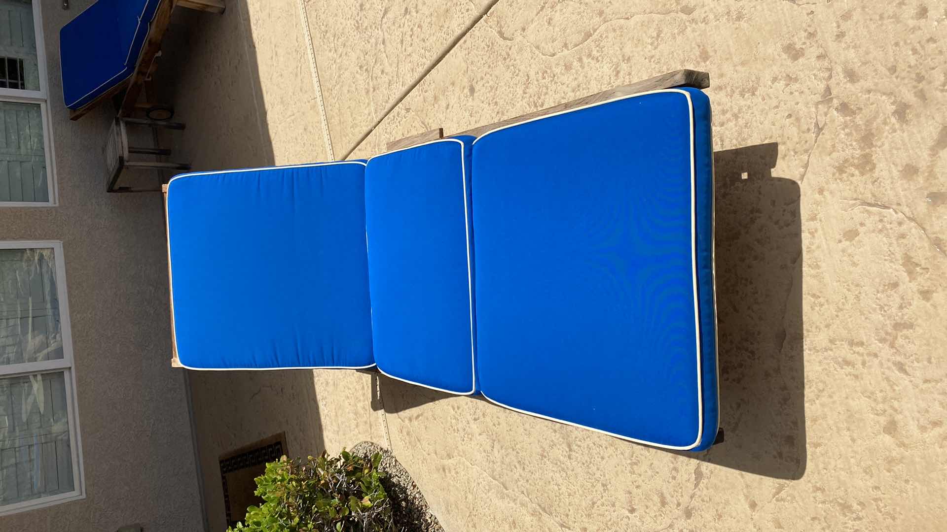 Photo 1 of TEAK WAREHOUSE CHAISE LOUNGE WITH WATER REPELLANT AND SUN PROTECTION FABRIC MARINE BLUE CUSHION 