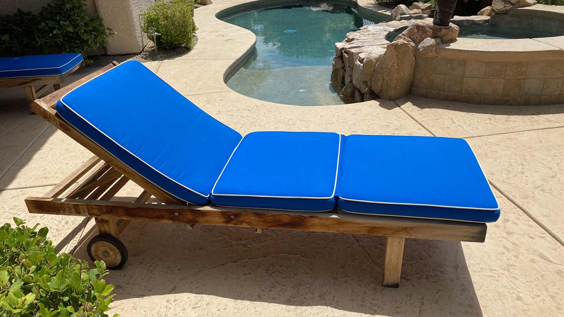 Photo 1 of TEAK WAREHOUSE CHAISE LOUNGE WITH WATER REPELLANT AND SUN PROTECTION FABRIC MARINE BLUE CUSHION 