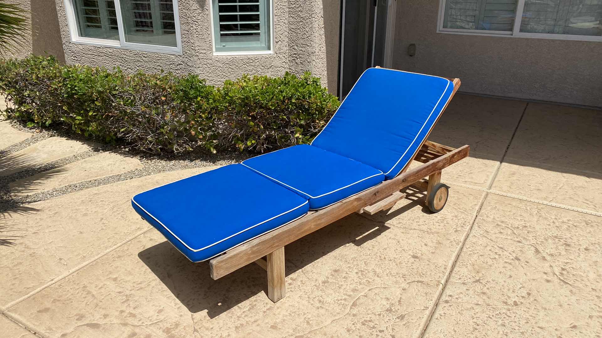 Photo 1 of TEAK WAREHOUSE CHAISE LOUNGE WITH WATER REPELLANT AND SUN PROTECTION FABRIC MARINE BLUE CUSHION 