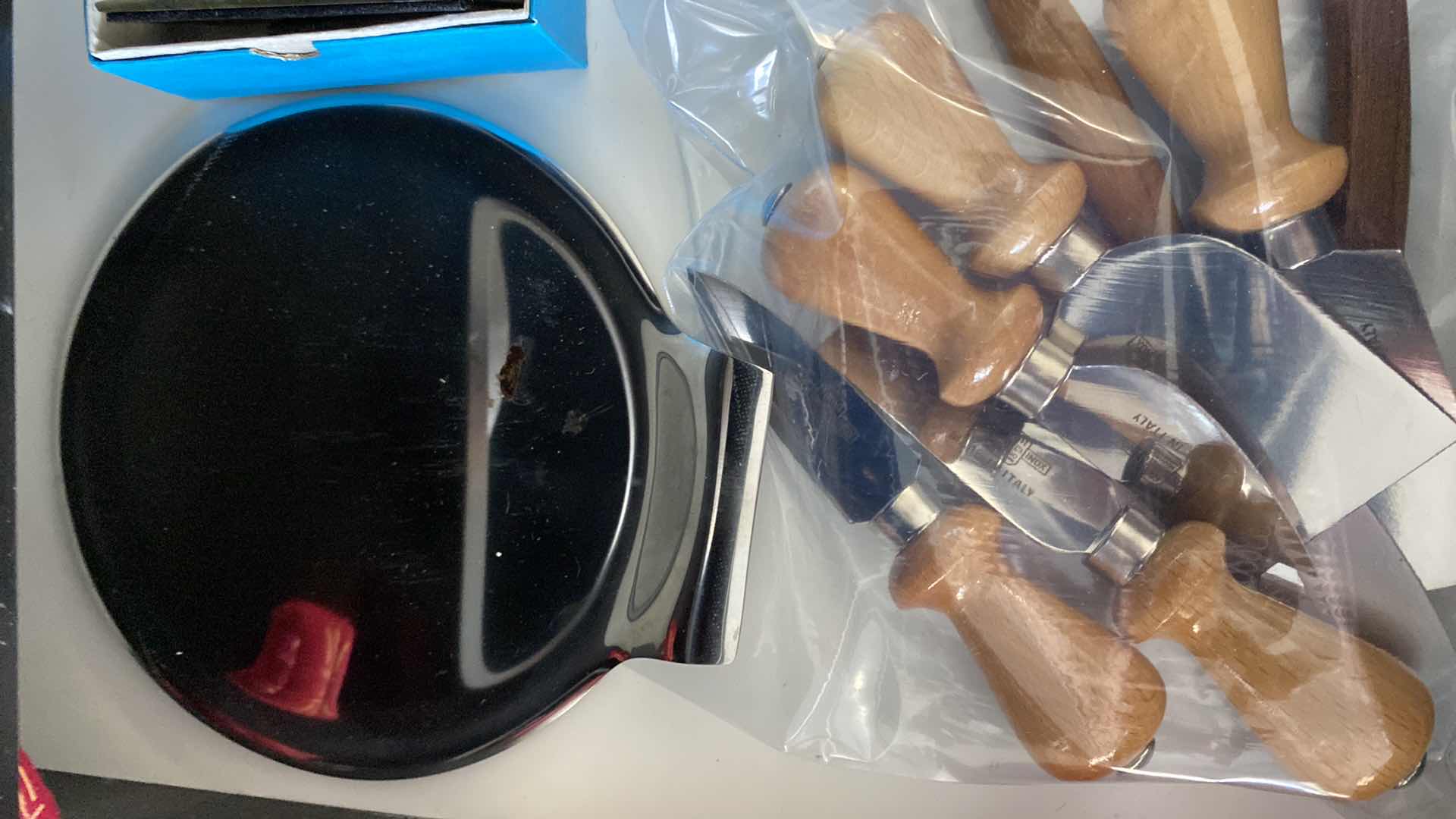 Photo 1 of CONTENTS OF DRAWER TRIVETS NAPKIN RINGS AND MORE