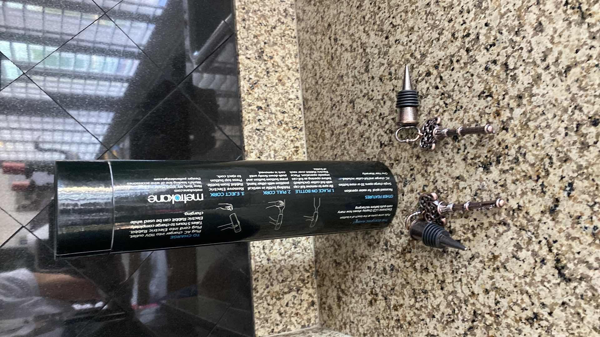 Photo 1 of ELECTRIC TABLE WINE OPENER AND PAIR OF WINE STOPPERS