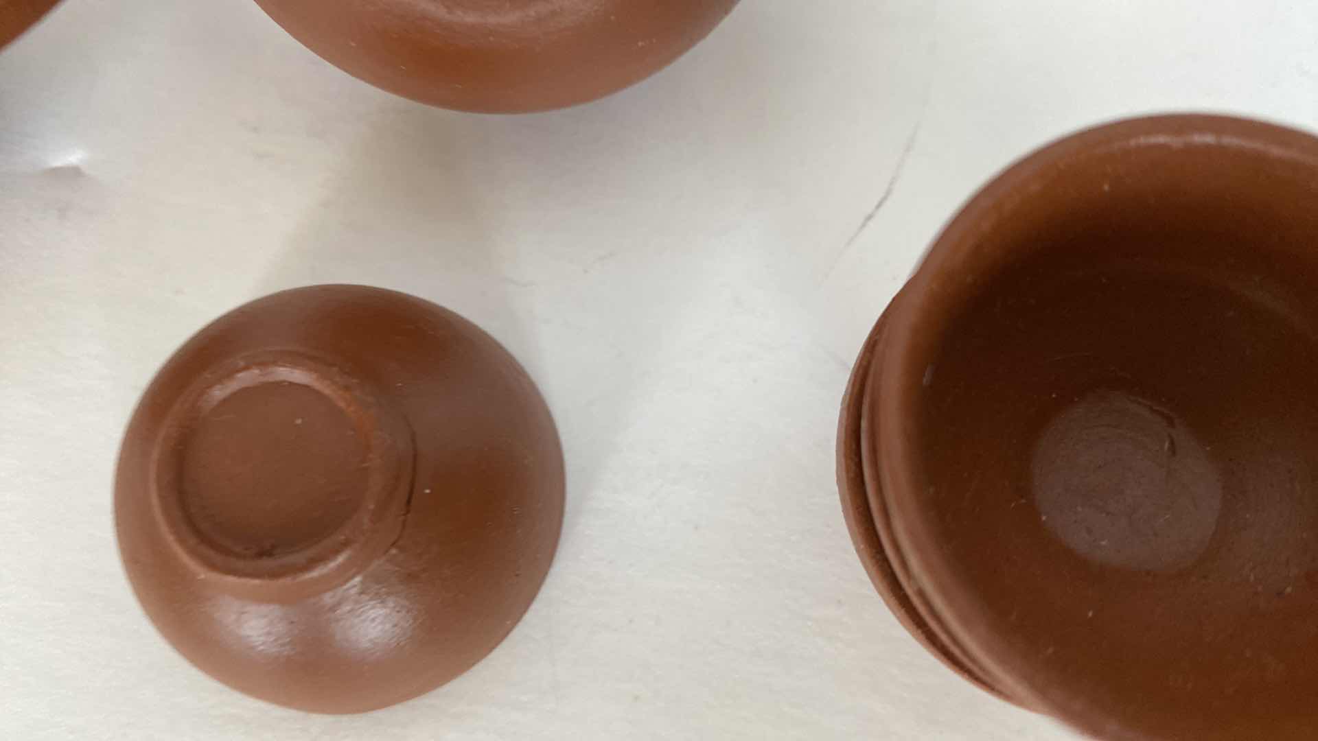 Photo 1 of PAIR OF VINTAGE CHINESE COLLECTIBLE CLAY TEA POTS WITH 4 TEA CUPS LARGEST TEAPOT 3 1/4” x 1 3/4”