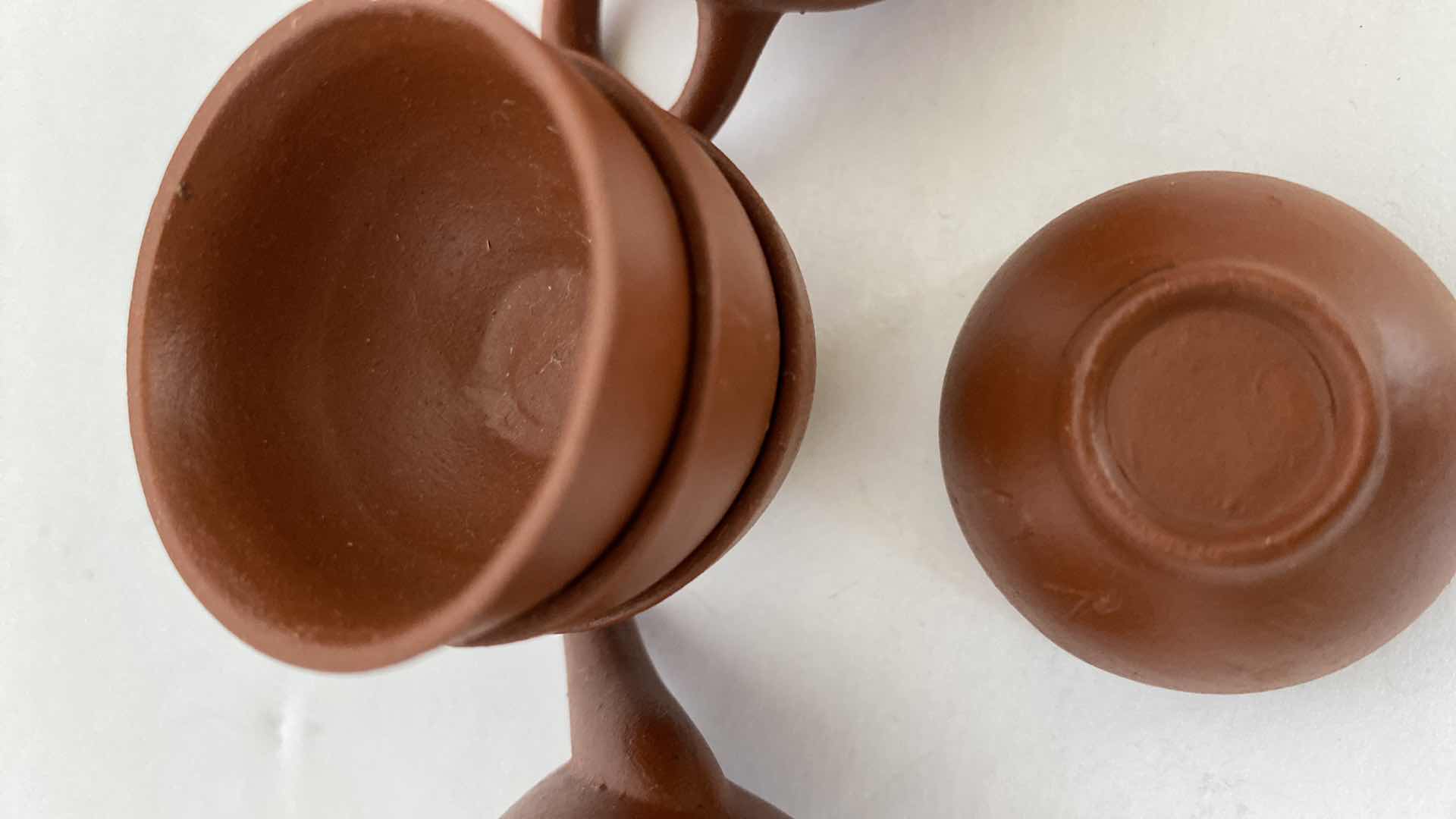 Photo 1 of PAIR OF VINTAGE CHINESE COLLECTIBLE CLAY TEA POTS WITH 4 TEA CUPS LARGEST TEAPOT 3” x 2.25”.