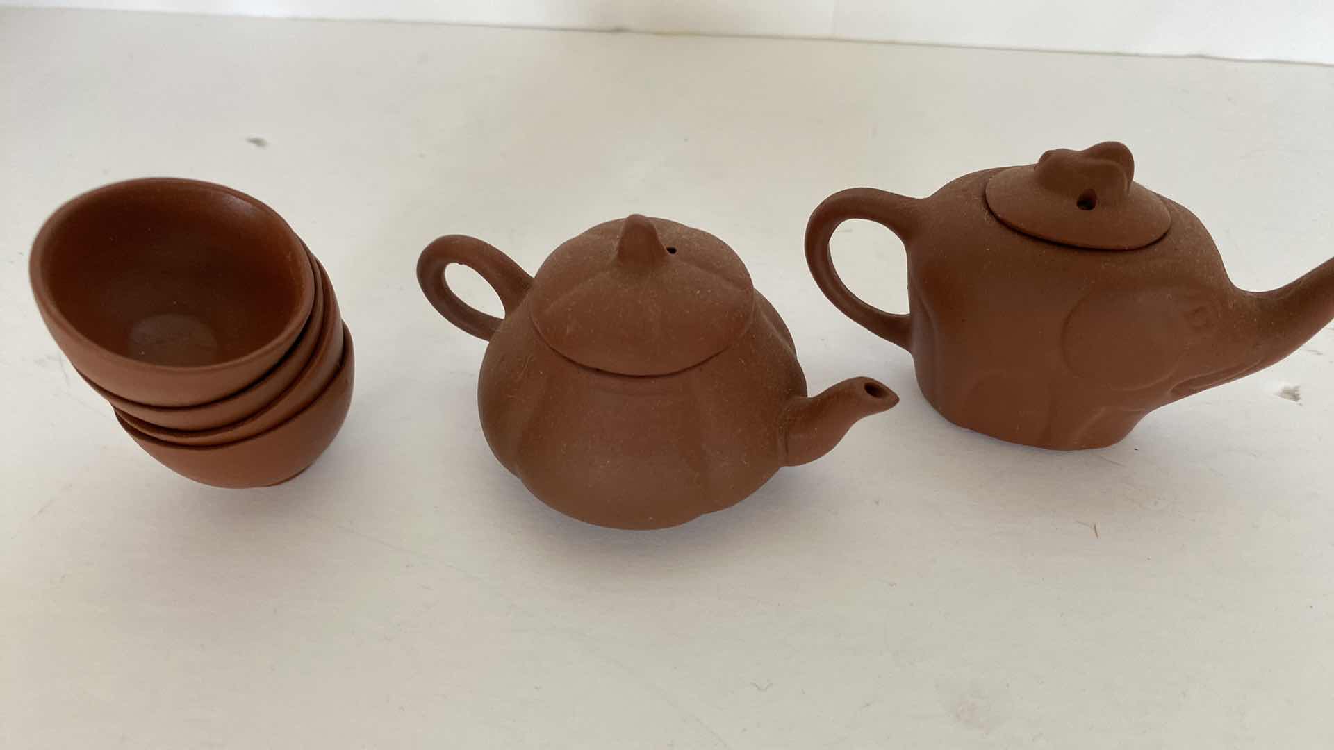 Photo 1 of PAIR OF VINTAGE CHINESE COLLECTIBLE CLAY TEA POTS WITH 4 TEA CUPS LARGEST TEAPOT 3.25“ x 2“