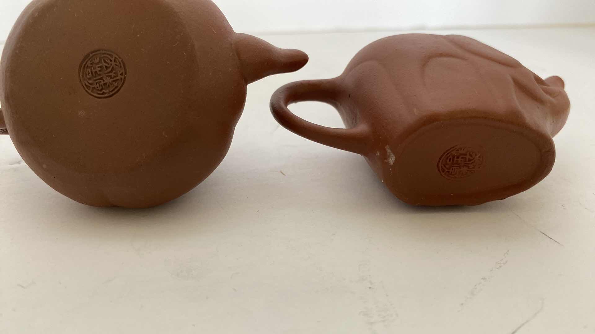 Photo 1 of PAIR OF VINTAGE CHINESE COLLECTIBLE CLAY TEA POTS WITH 4 TEA CUPS LARGEST TEAPOT 3.25“ x 2“