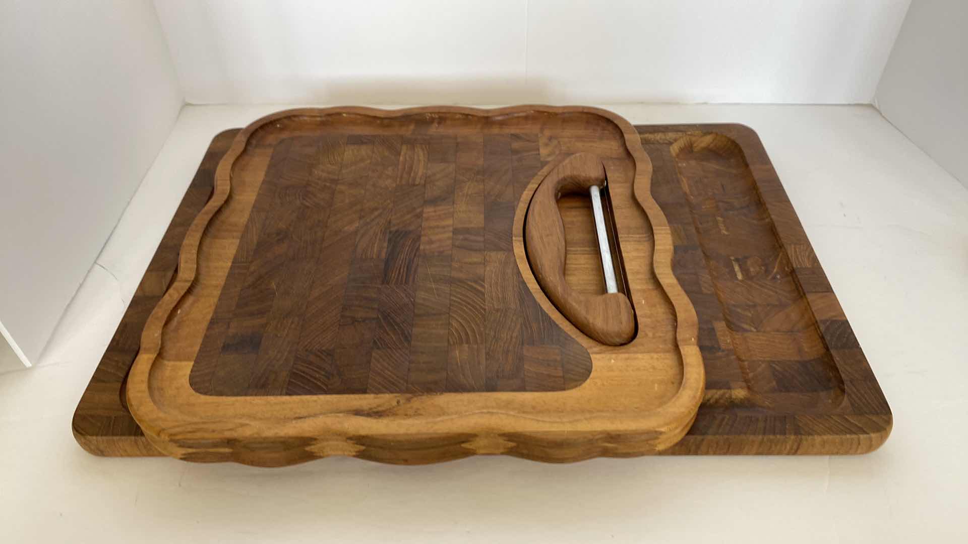 Photo 1 of PAIR OF DECORATIVE WOOD CUTTING BOARDS LARGEST 17” x 11 1/2”