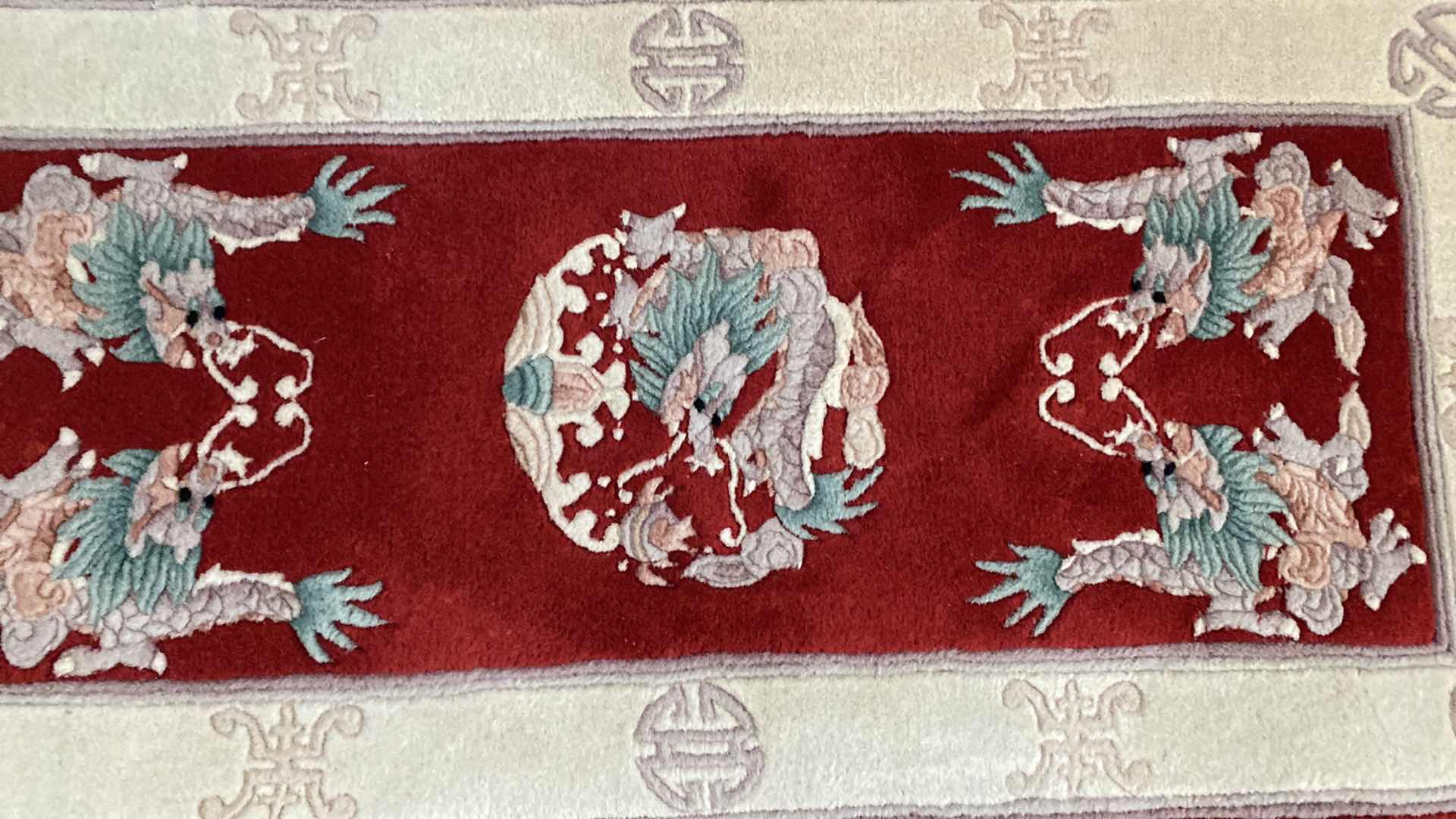 Photo 1 of HAND WOVEN WOOL RUG FROM HONG KONG 23” x 56”