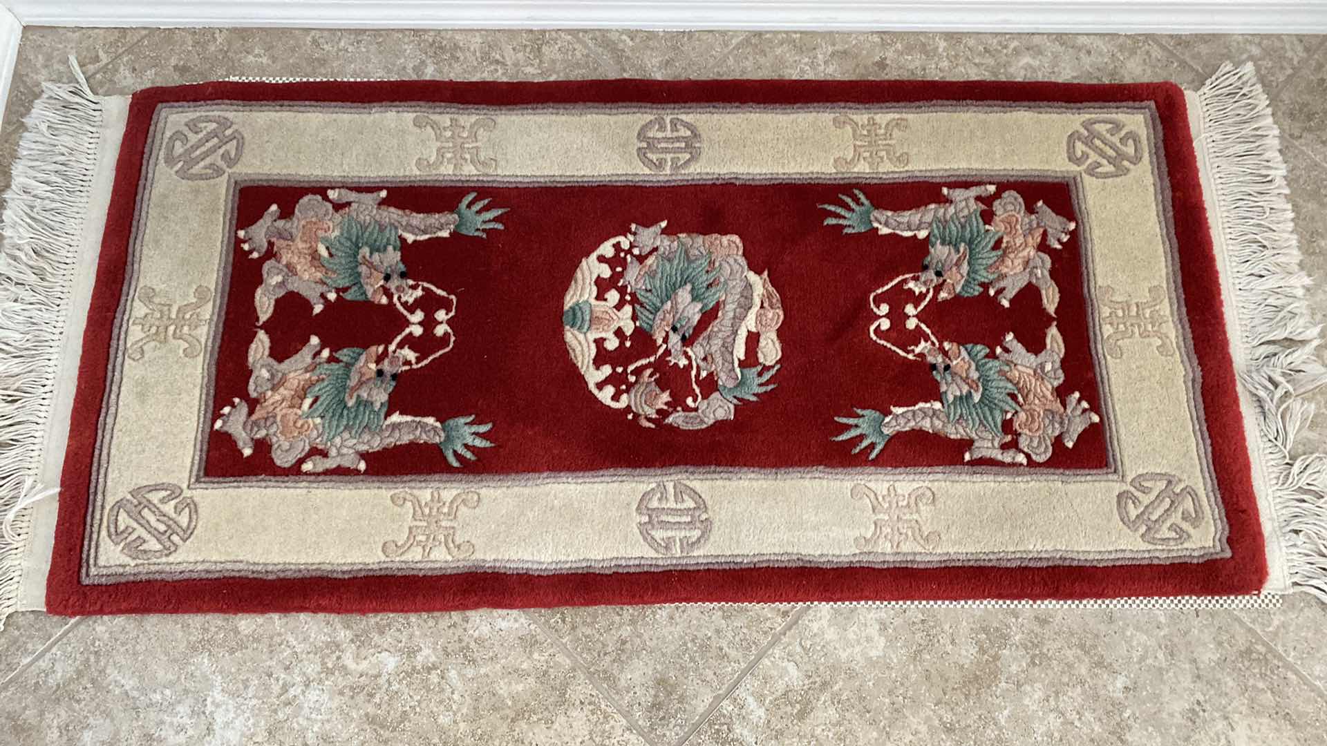 Photo 1 of HAND WOVEN WOOL RUG FROM HONG KONG 23” x 56”