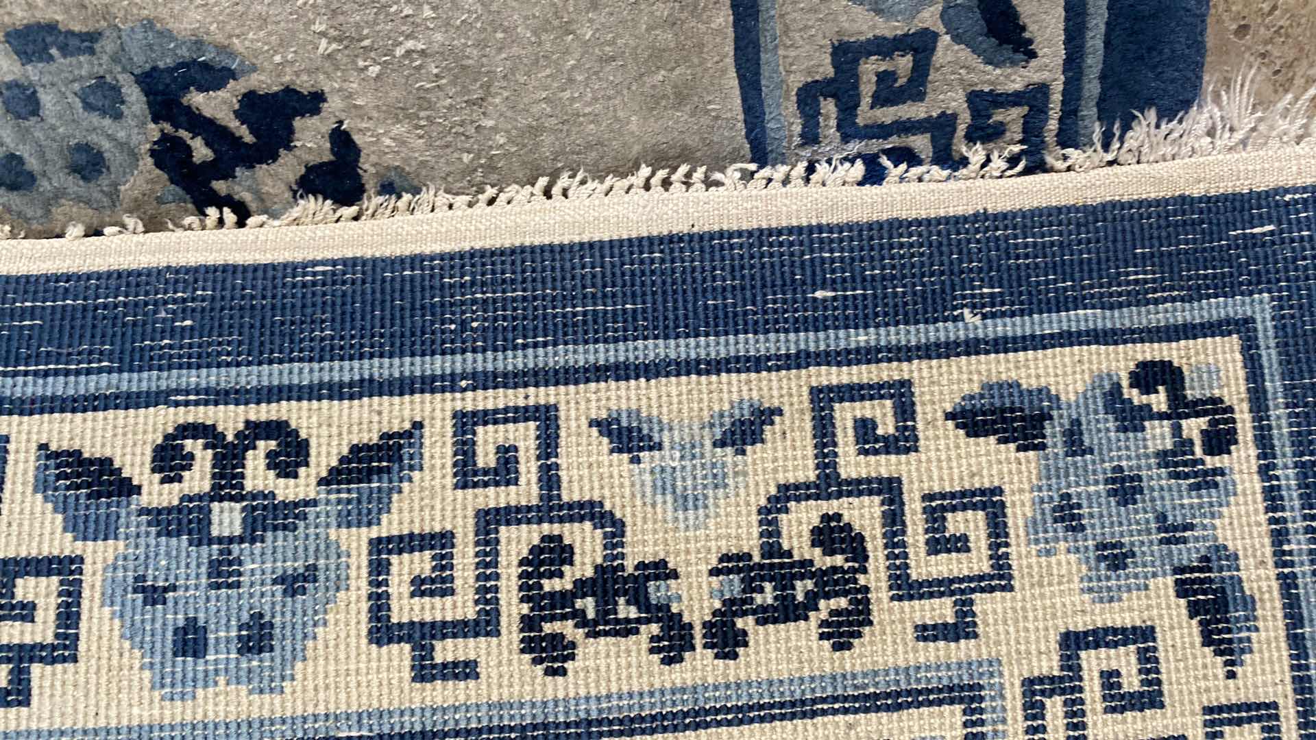 Photo 1 of HAND OVEN BLUE AND SILVER RUG FROM HONG KONG 24“ x 49“