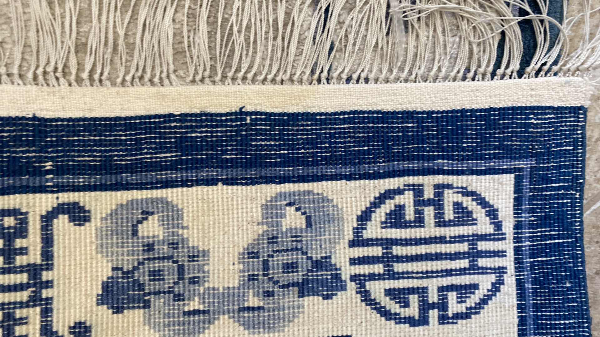 Photo 1 of HAND OVEN BLUE AND SILVER RUG FROM HONG KONG 24“ x 49“