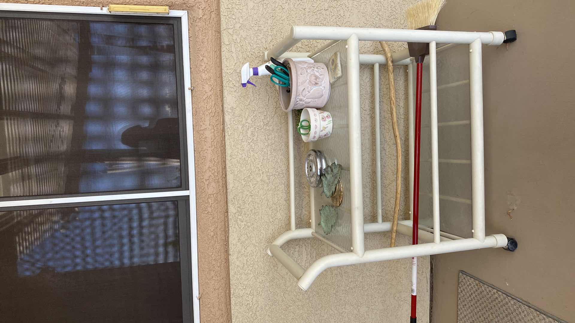 Photo 1 of OUTDOOR CART WITH GLASS TOP 34“ x 18“ x H35“ I NCLUDES ITEMS ON CART