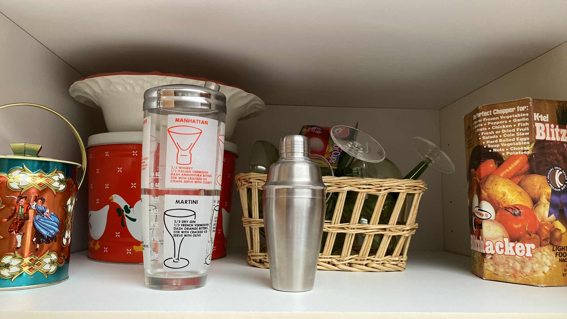 Photo 1 of CONTENTS OF KITCHEN CABINET SHAKERS, WINE DECOR AND MORE