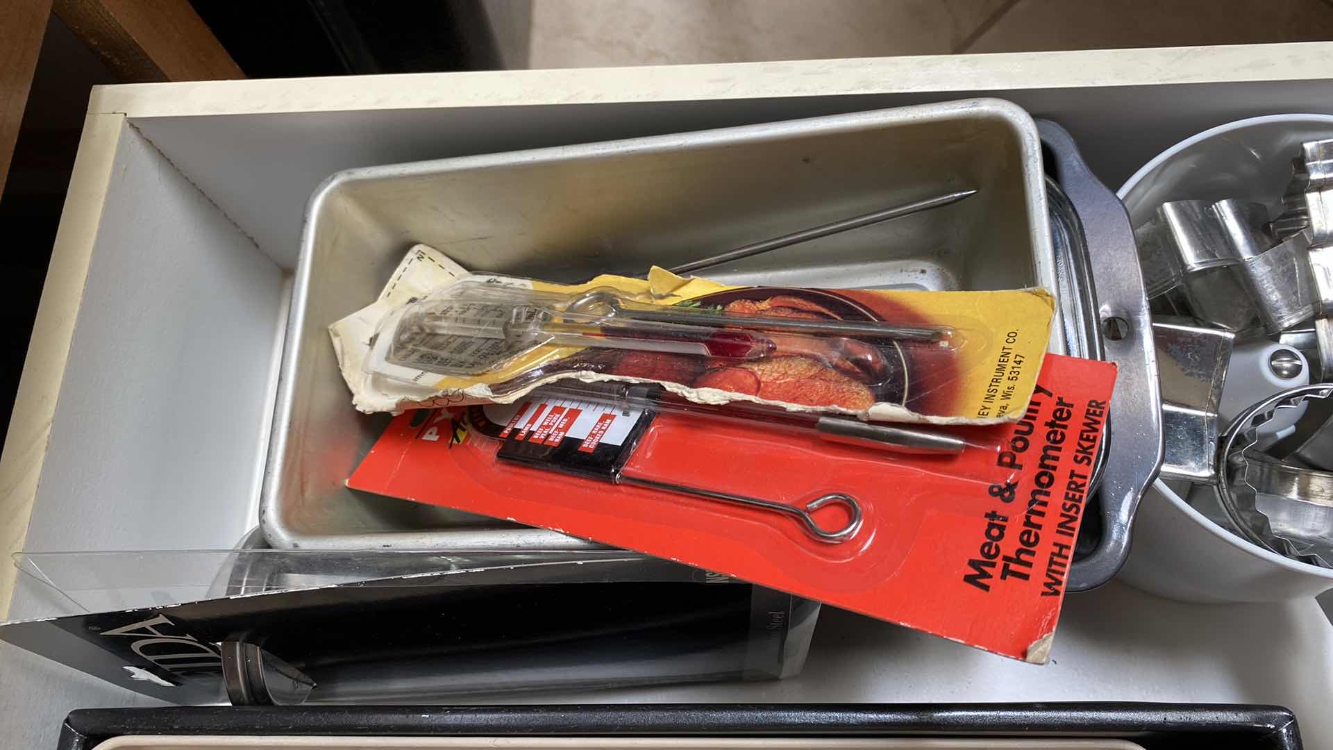 Photo 1 of CONTENTS OF DRAWER BAKING PANS AND MORE