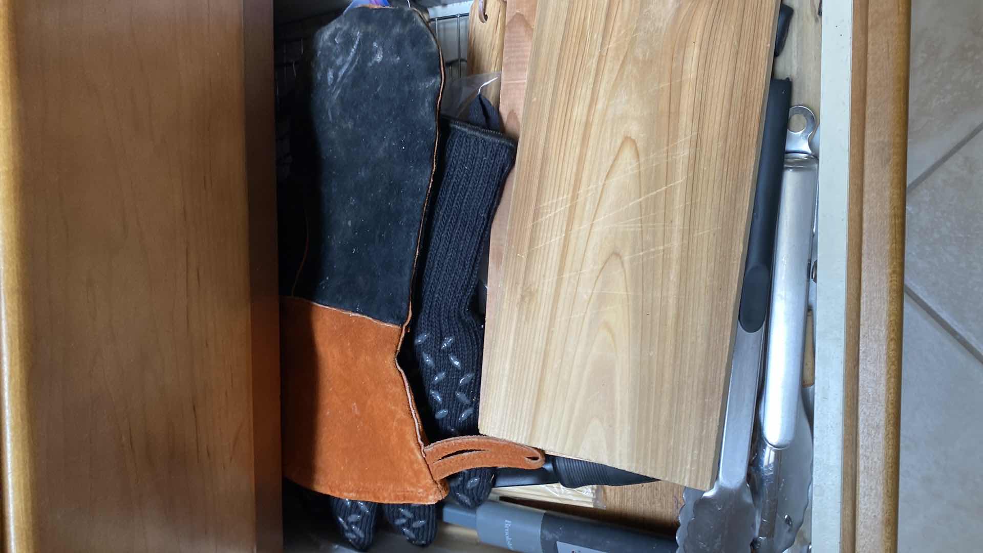 Photo 1 of CONTENTS OF 4 DRAWERS POT HOLDERS UTENSILS AND MORE