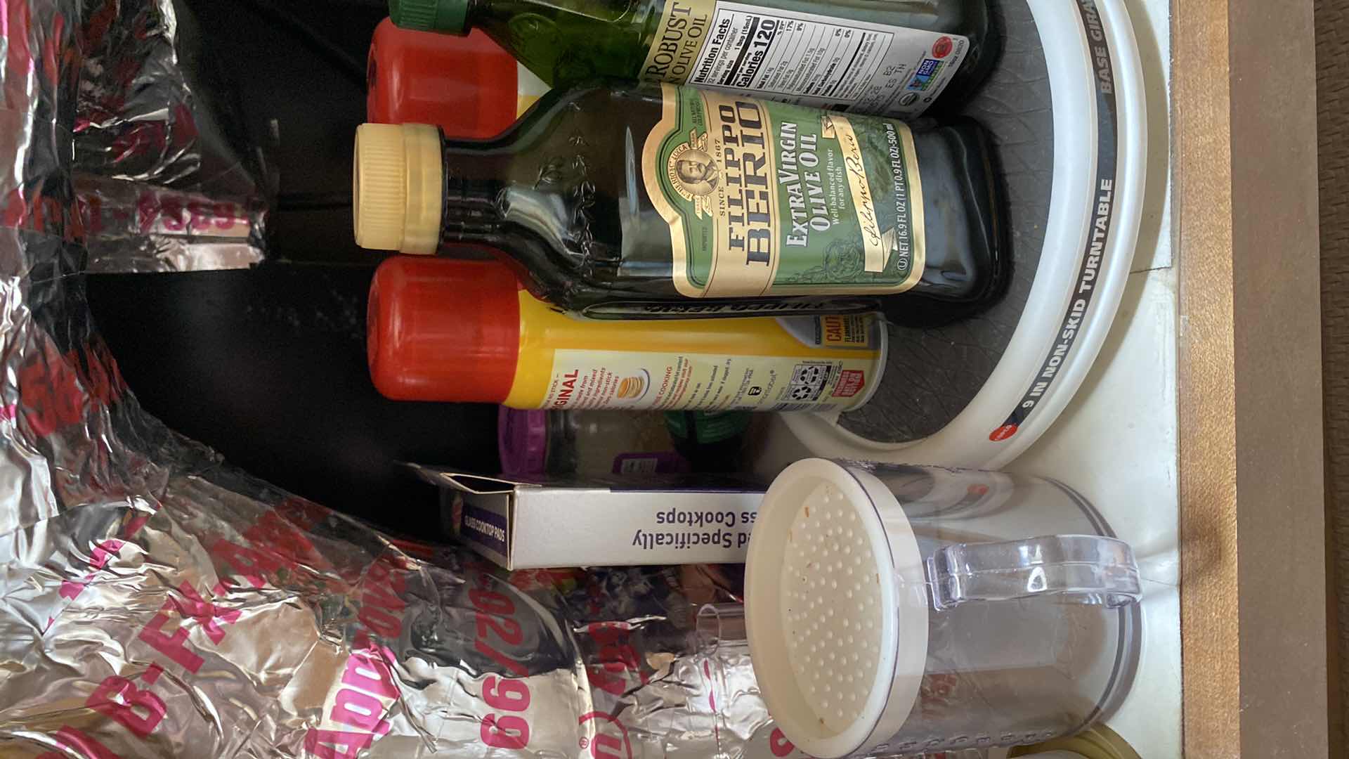 Photo 1 of CONTENTS UNDER KITCHEN CABINET OILS AND MORE