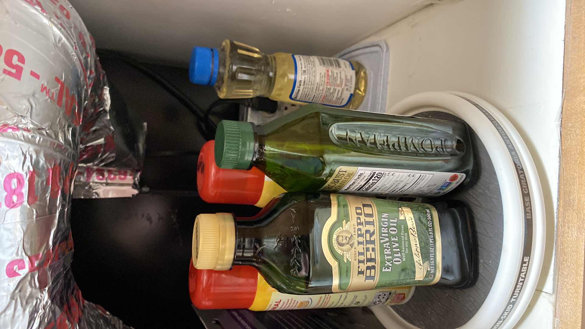 Photo 1 of CONTENTS UNDER KITCHEN CABINET OILS AND MORE