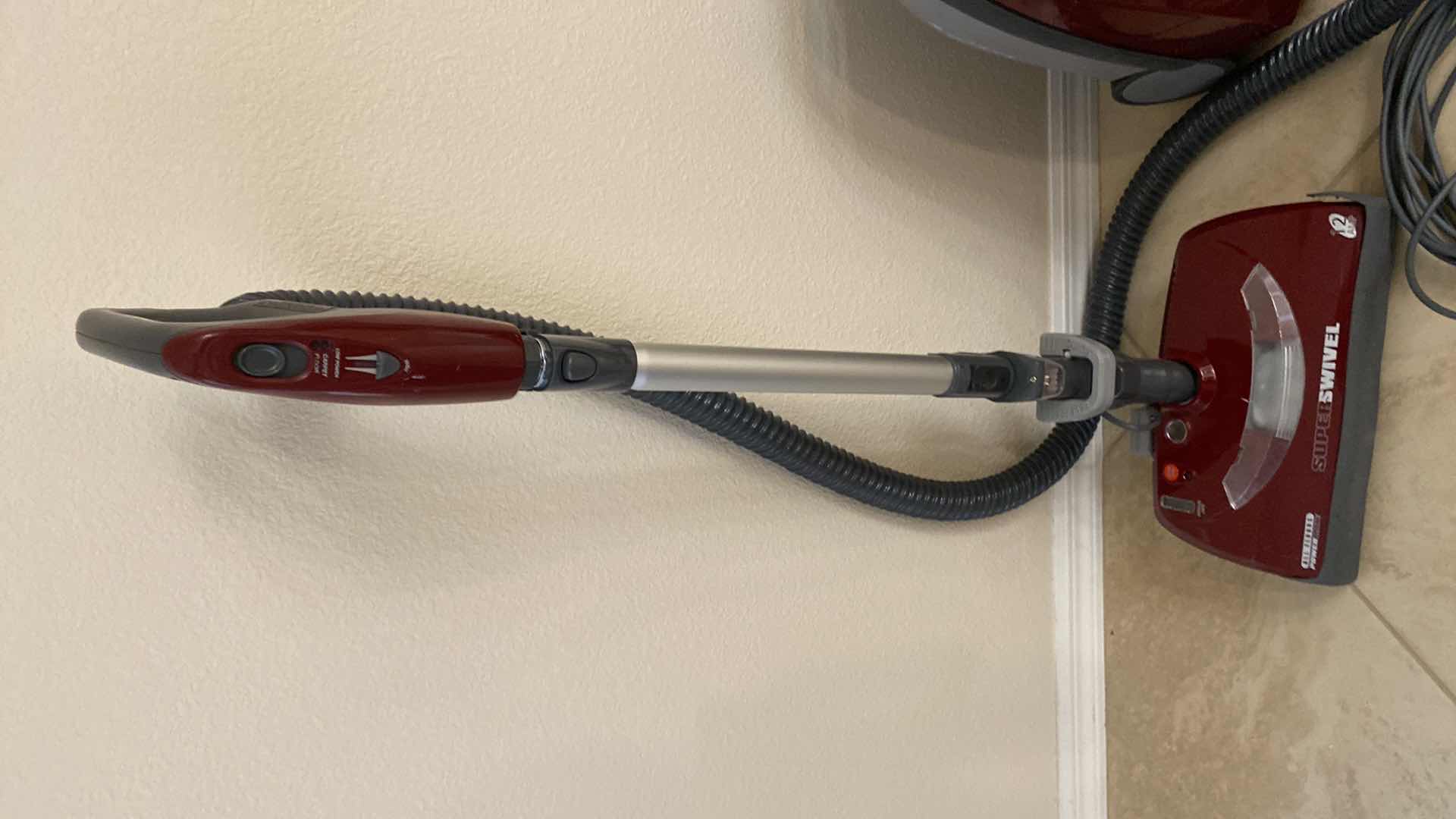 Photo 1 of KENMORE INTUITION CANISTER VACUUM WITH BAGS POWERS ON