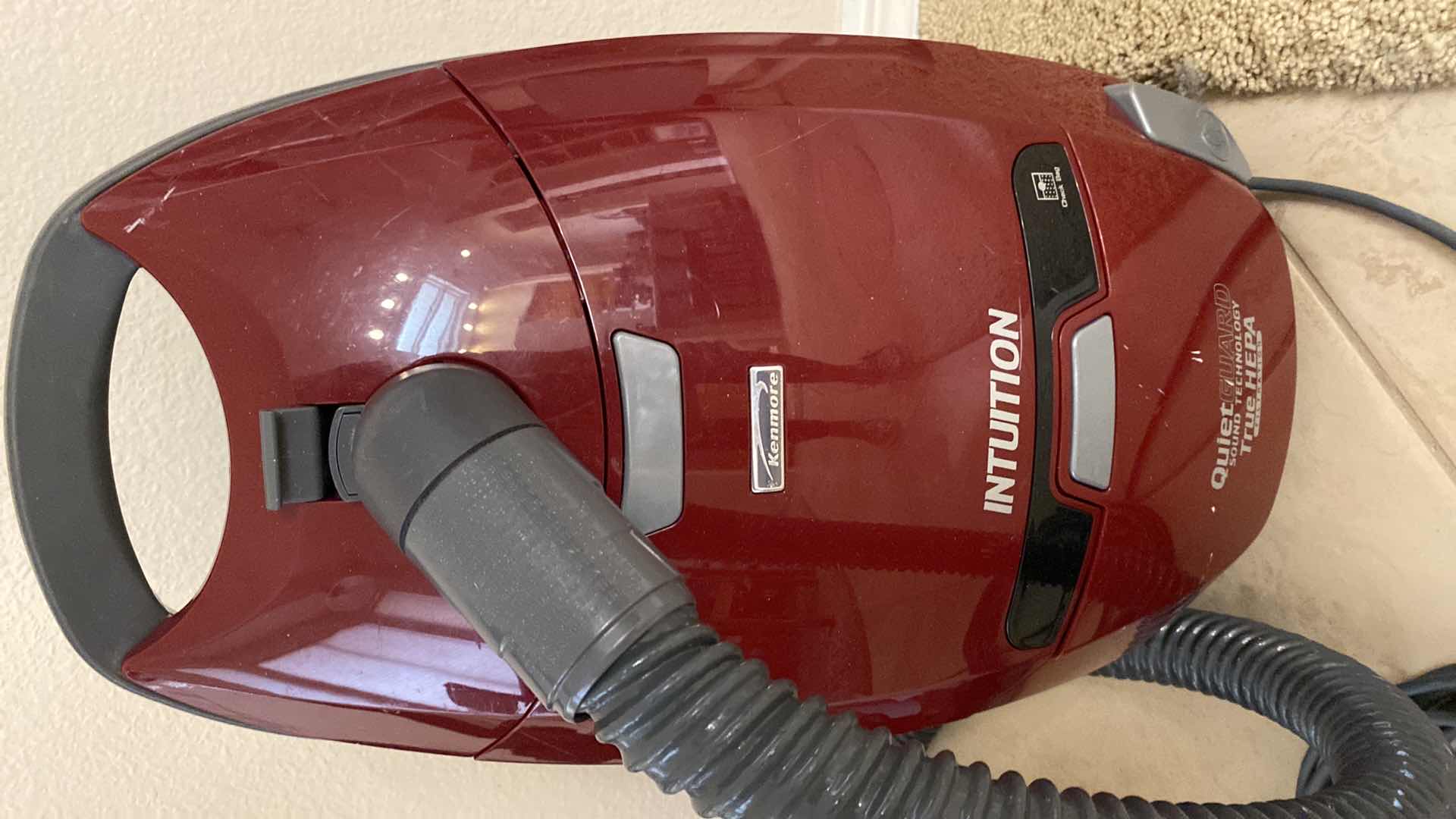 Photo 1 of KENMORE INTUITION CANISTER VACUUM WITH BAGS POWERS ON