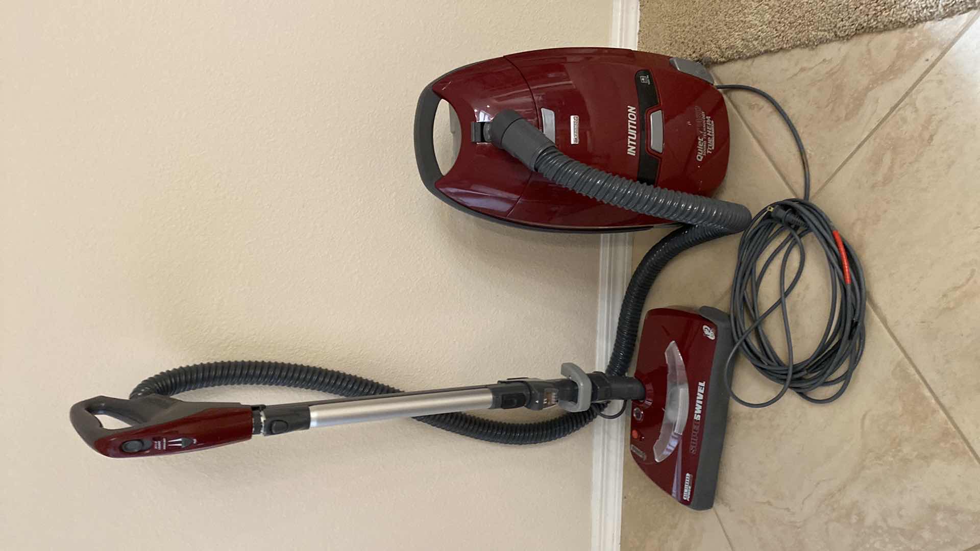 Photo 1 of KENMORE INTUITION CANISTER VACUUM WITH BAGS POWERS ON