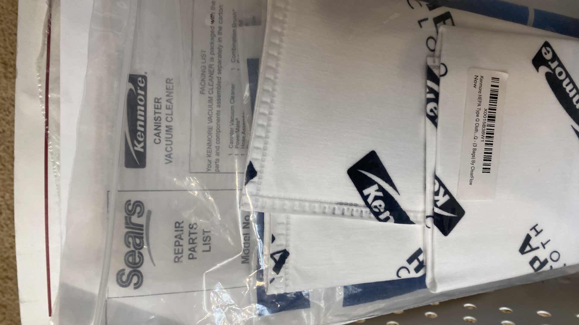 Photo 1 of KENMORE INTUITION CANISTER VACUUM WITH BAGS POWERS ON