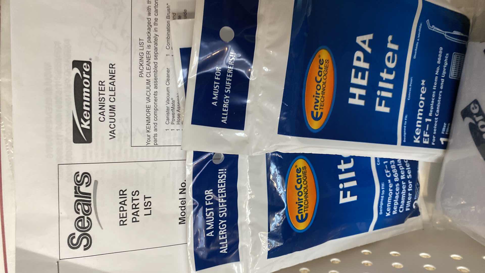 Photo 1 of KENMORE INTUITION CANISTER VACUUM WITH BAGS POWERS ON