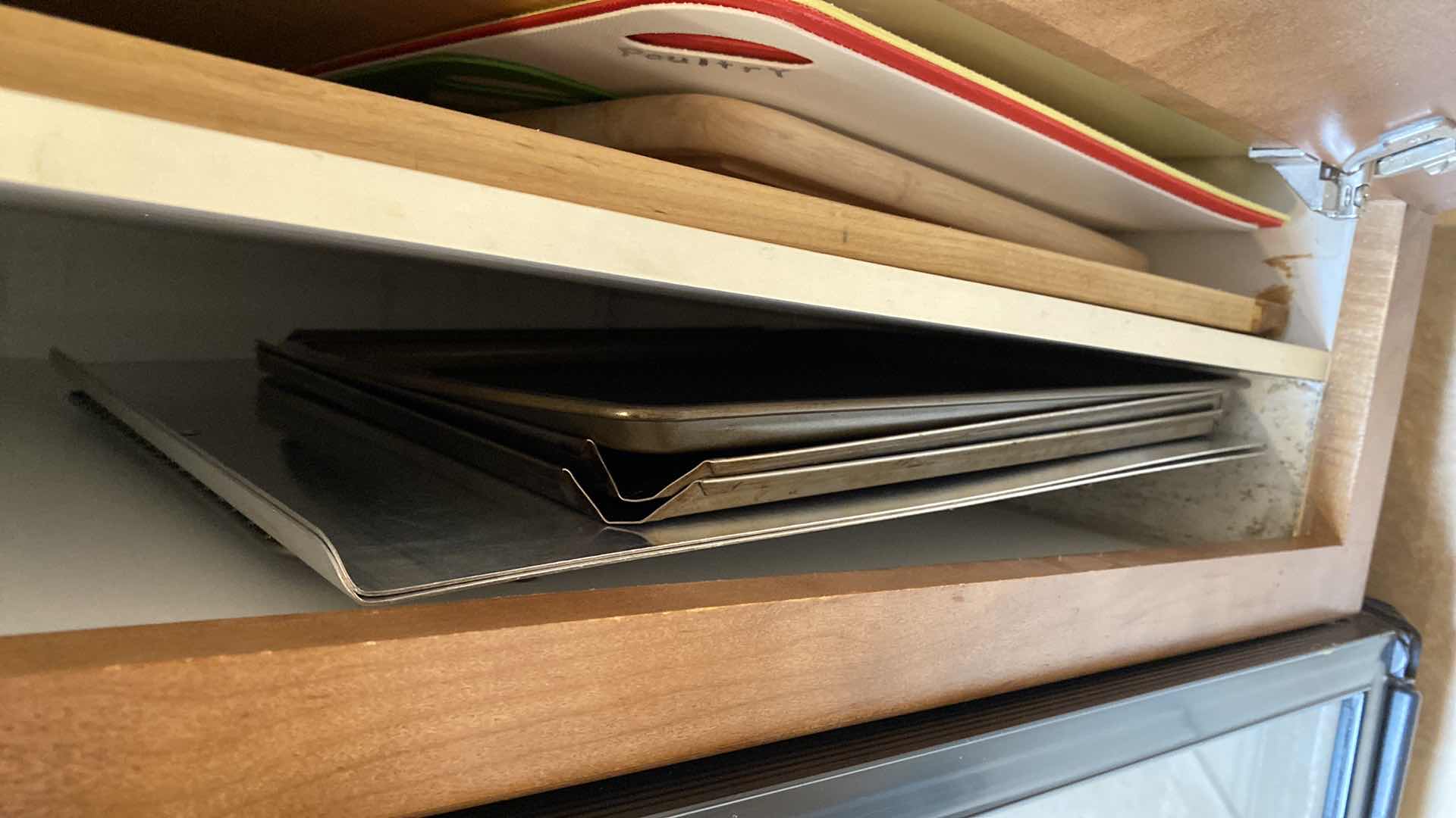 Photo 1 of CONTENTS OF CABINET BAKEWARE AND CUTTING BOARDS