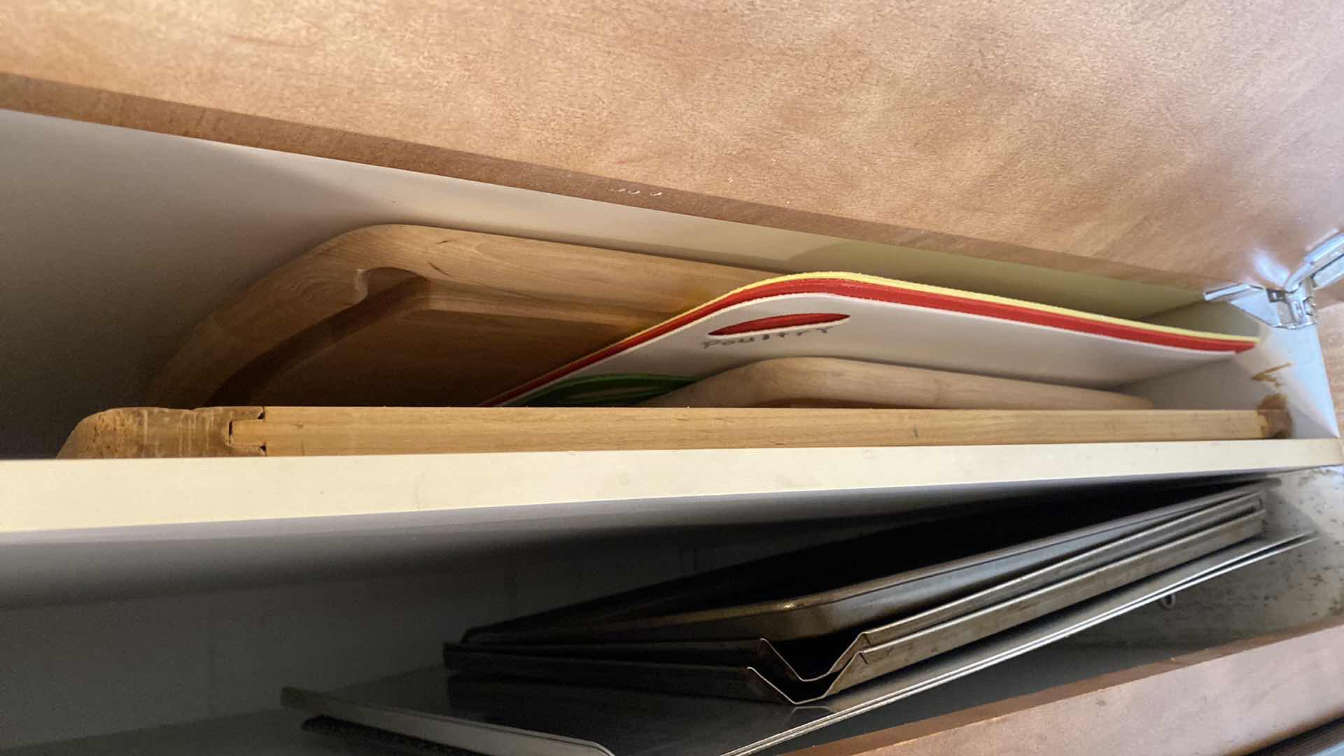 Photo 1 of CONTENTS OF CABINET BAKEWARE AND CUTTING BOARDS