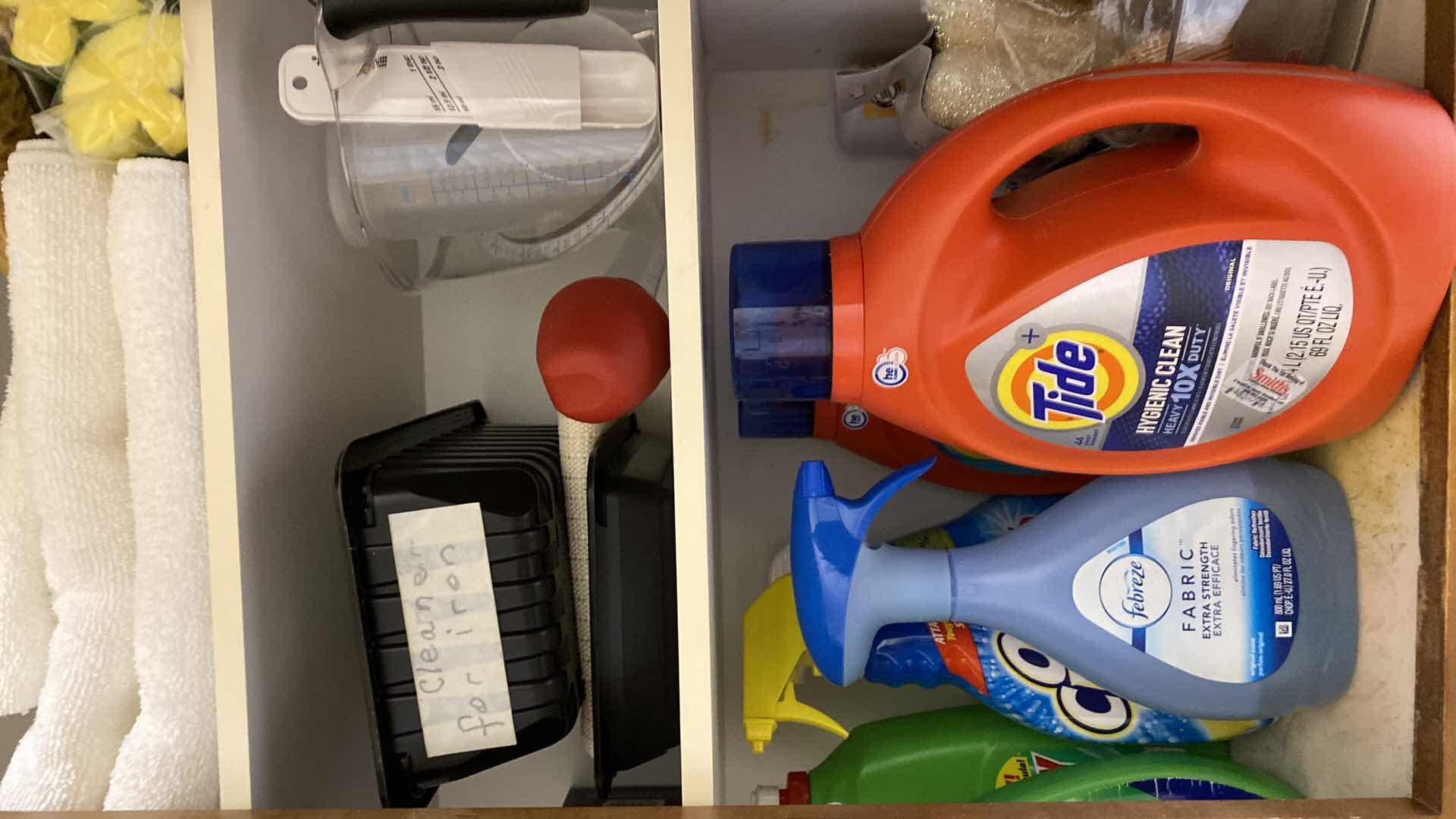 Photo 1 of CONTENTS OF CABINET LAUNDRY ROOM DETERGENT RAGS TRAVEL IRON AND MORE