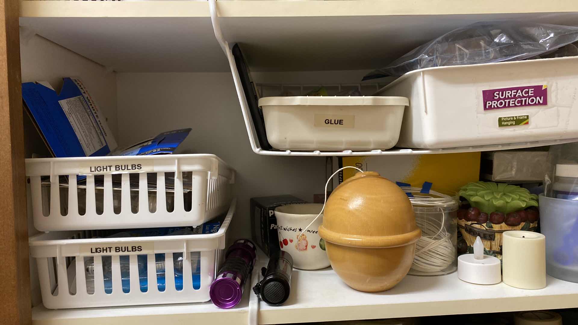 Photo 1 of CONTENTS OF CABINET LAUNDRY ROOM HOLIDAY DECOR TAPE BULBS AND MORE