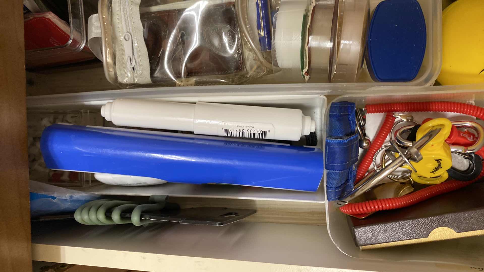 Photo 1 of CONTENTS OF DRAWER LAUNDRY ROOM FLASHLIGHTS AND MORE