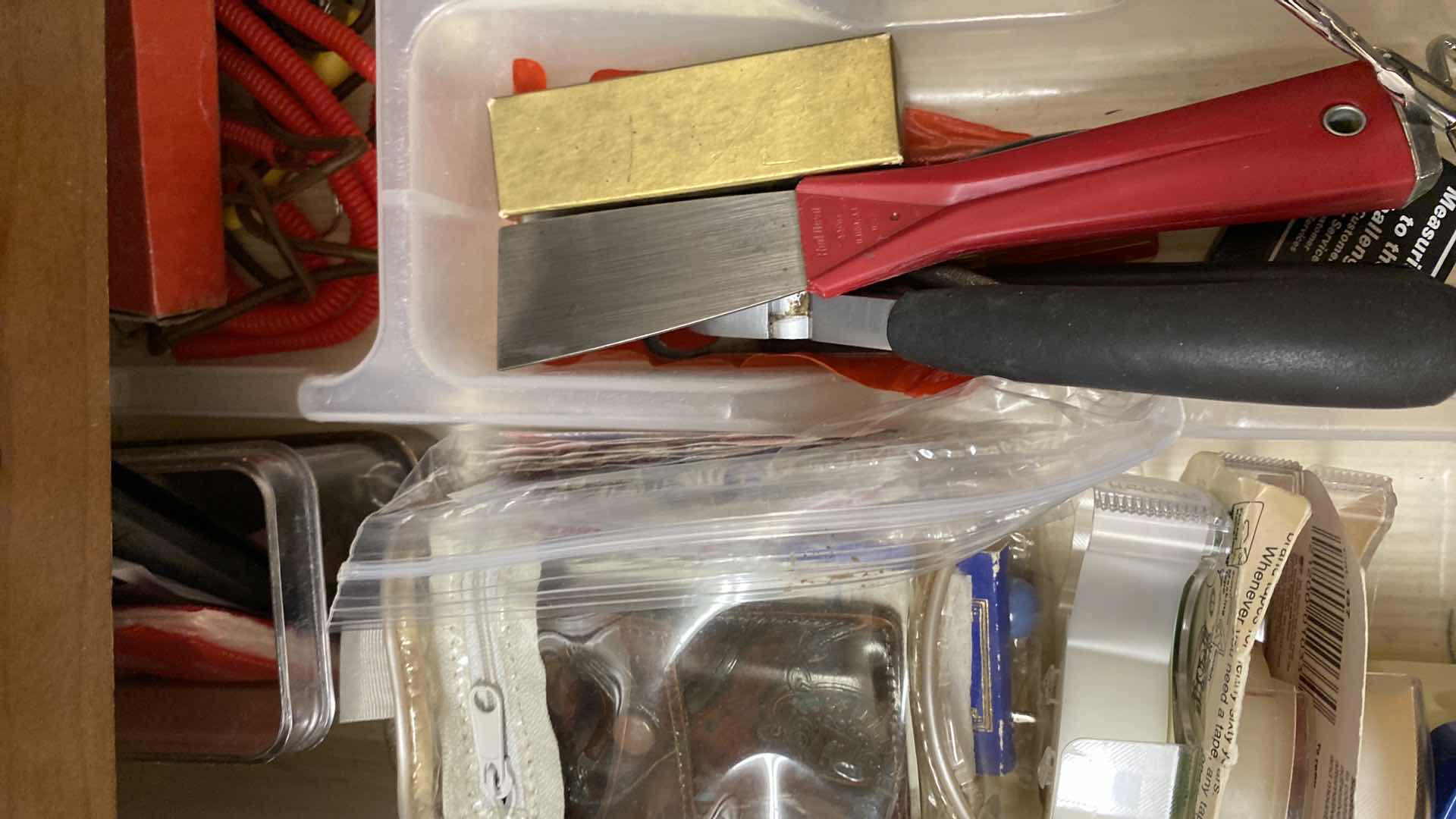 Photo 1 of CONTENTS OF DRAWER LAUNDRY ROOM FLASHLIGHTS AND MORE