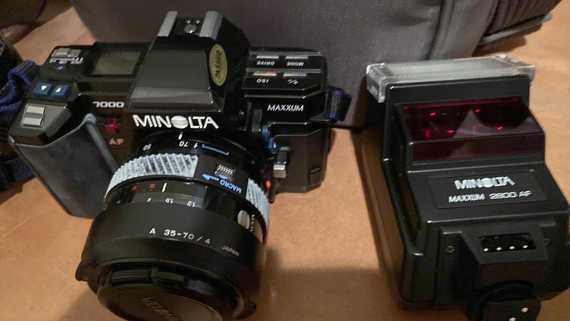 Photo 1 of MINOLTA CAMERA 7000 MAXXUM WITH EXTRA LENS FLASH AND BAG