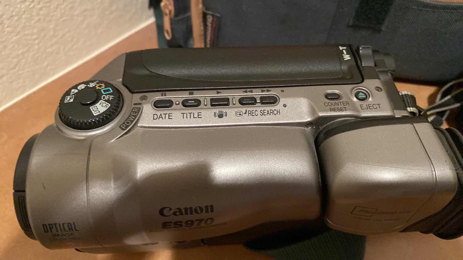 Photo 1 of BUSHNELL BINOCULARS AND CANNON ES970 MOVIE CAMERA