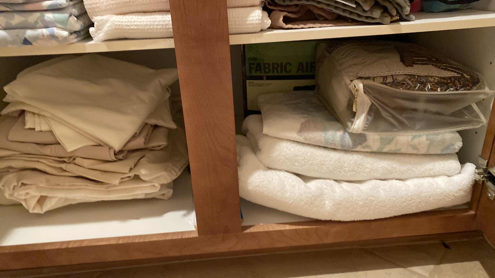 View 5 of Contents of 2 cabinets, quilts towels, linens