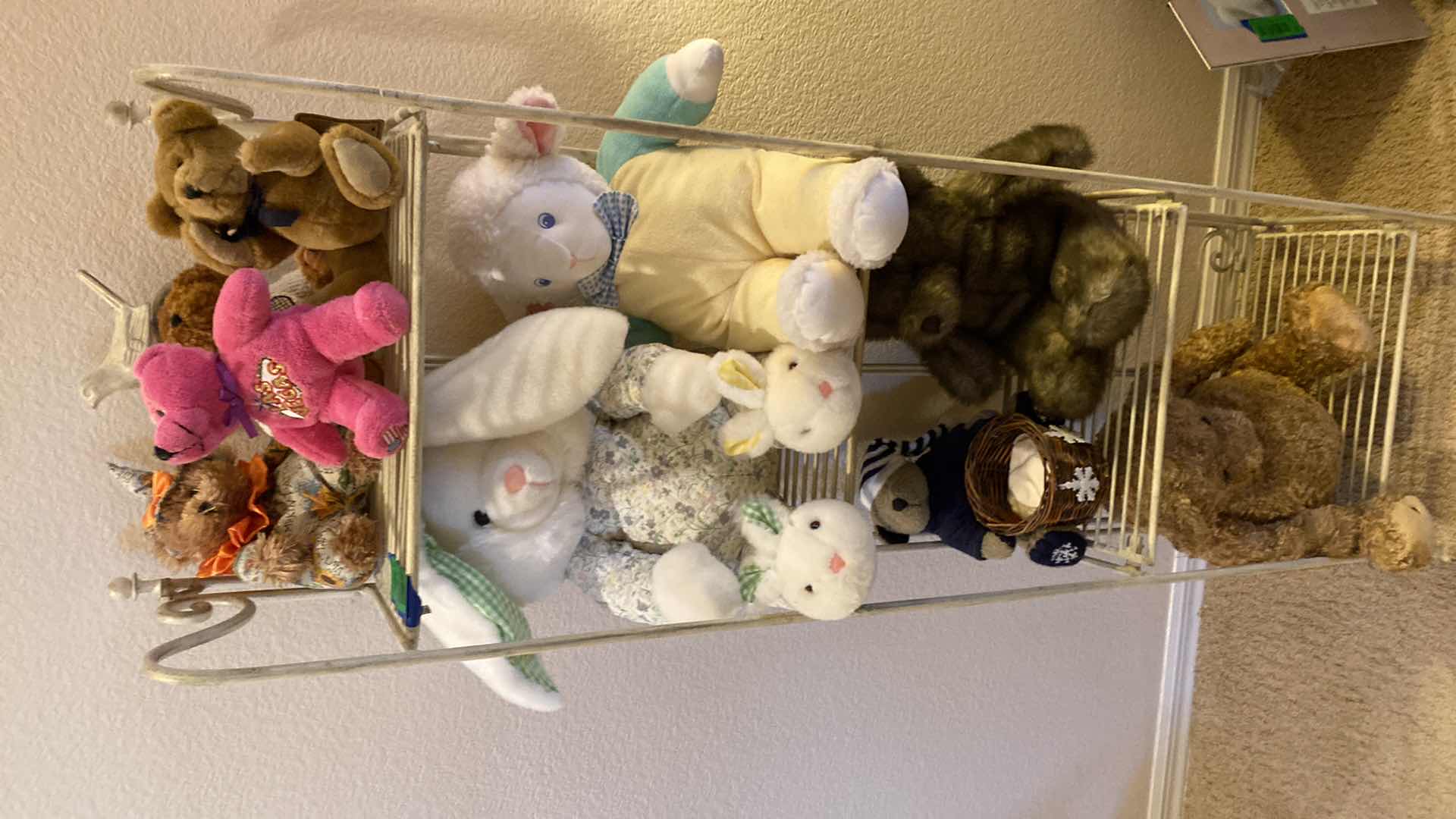 Photo 1 of Four shelf rack with stuffed animals 15“ x 9“ H 52”