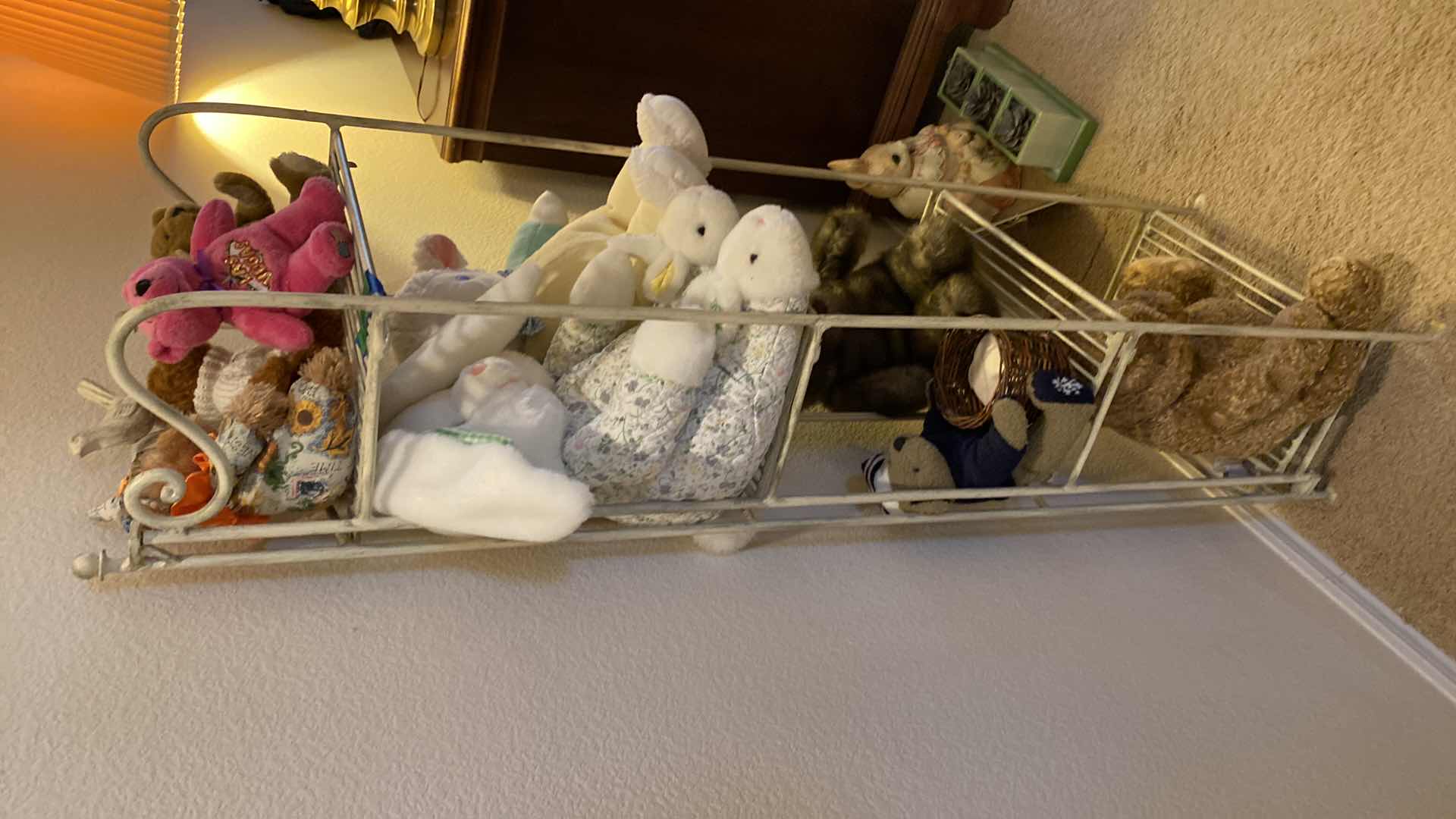 Photo 1 of Four shelf rack with stuffed animals 15“ x 9“ H 52”