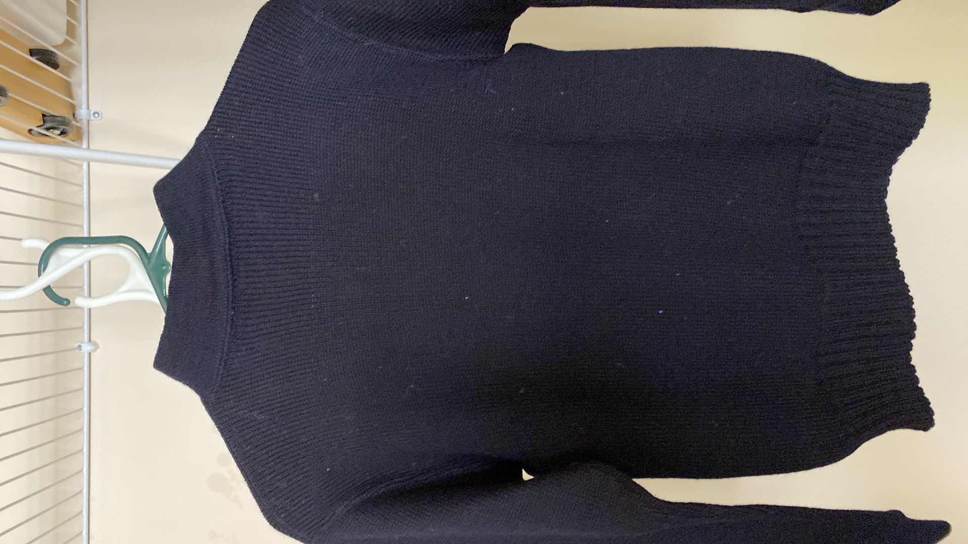 Photo 1 of 3 -  wool sweaters no sizes indicated, estimated one women’s medium and two men’s large