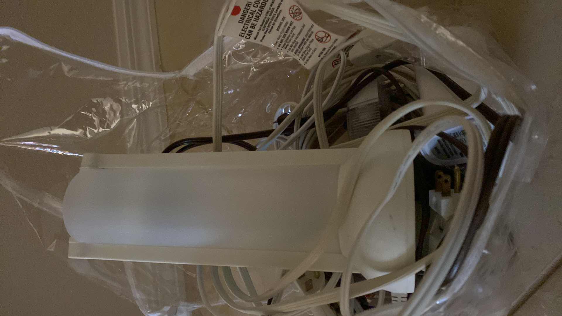 Photo 1 of Bags of extension cords, safety lights