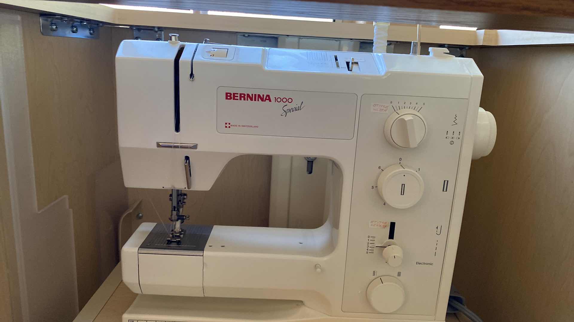 Photo 1 of BERNINA 1000 sewing machine in built in cabinet with storage