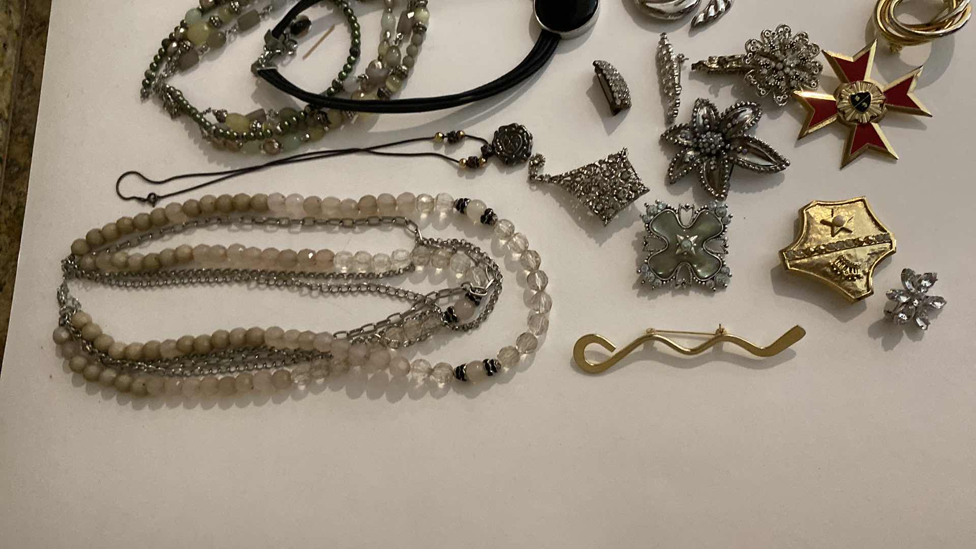 Photo 1 of ASSORTED COSTUME JEWELRY PINS AND NECKLACES