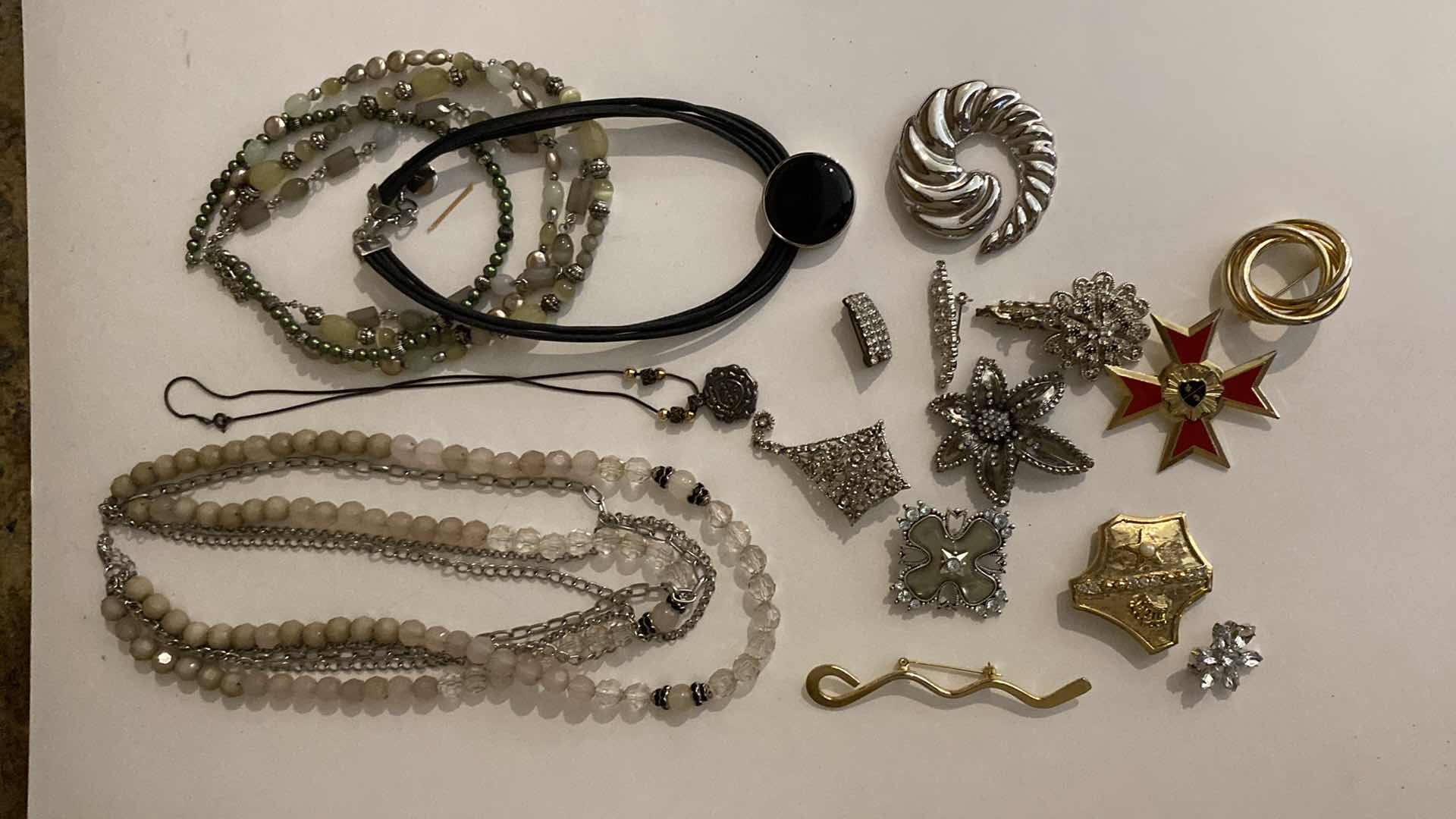 Photo 1 of ASSORTED COSTUME JEWELRY PINS AND NECKLACES
