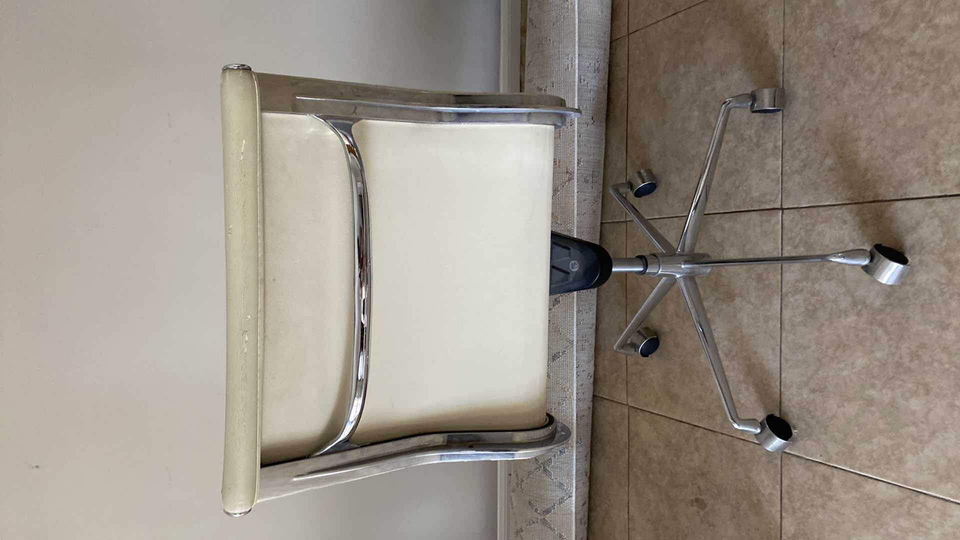 Photo 1 of MODERN ADJUSTABLE DESK CHAIR ON WHEELS