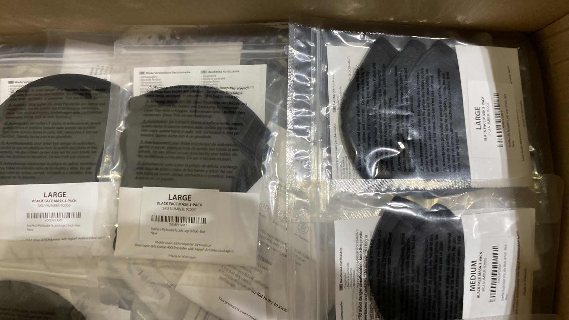 Photo 1 of BOX OF VARIOUS SIZE FACE MASKS