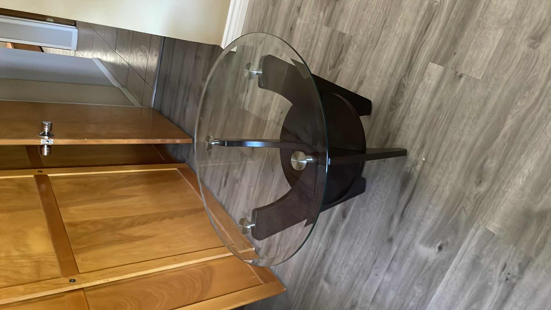 Photo 1 of DARK WOOD GLASS TOP END TABLE 28”x 24”H