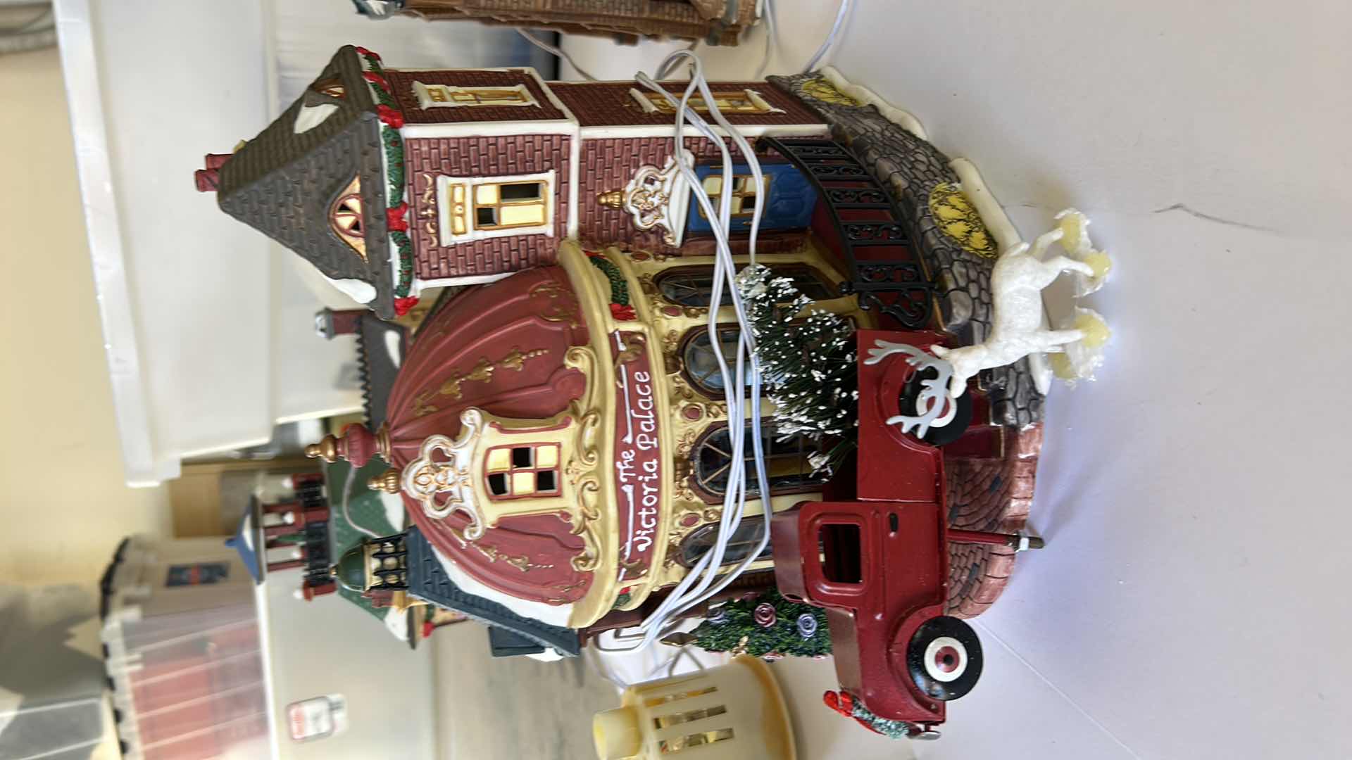 Photo 1 of LARGE TOTE WITH CHRISTMAS VILLAGE LIGHT UP HOUSES TALLEST 14”