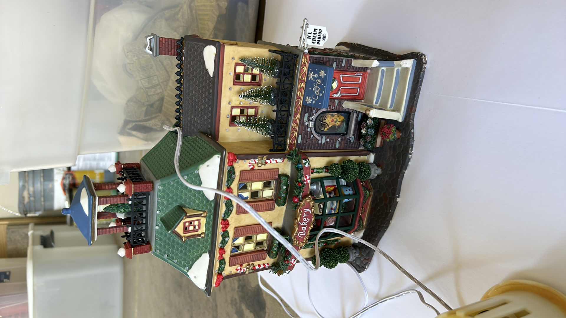 Photo 1 of LARGE TOTE WITH CHRISTMAS VILLAGE LIGHT UP HOUSES TALLEST 14”