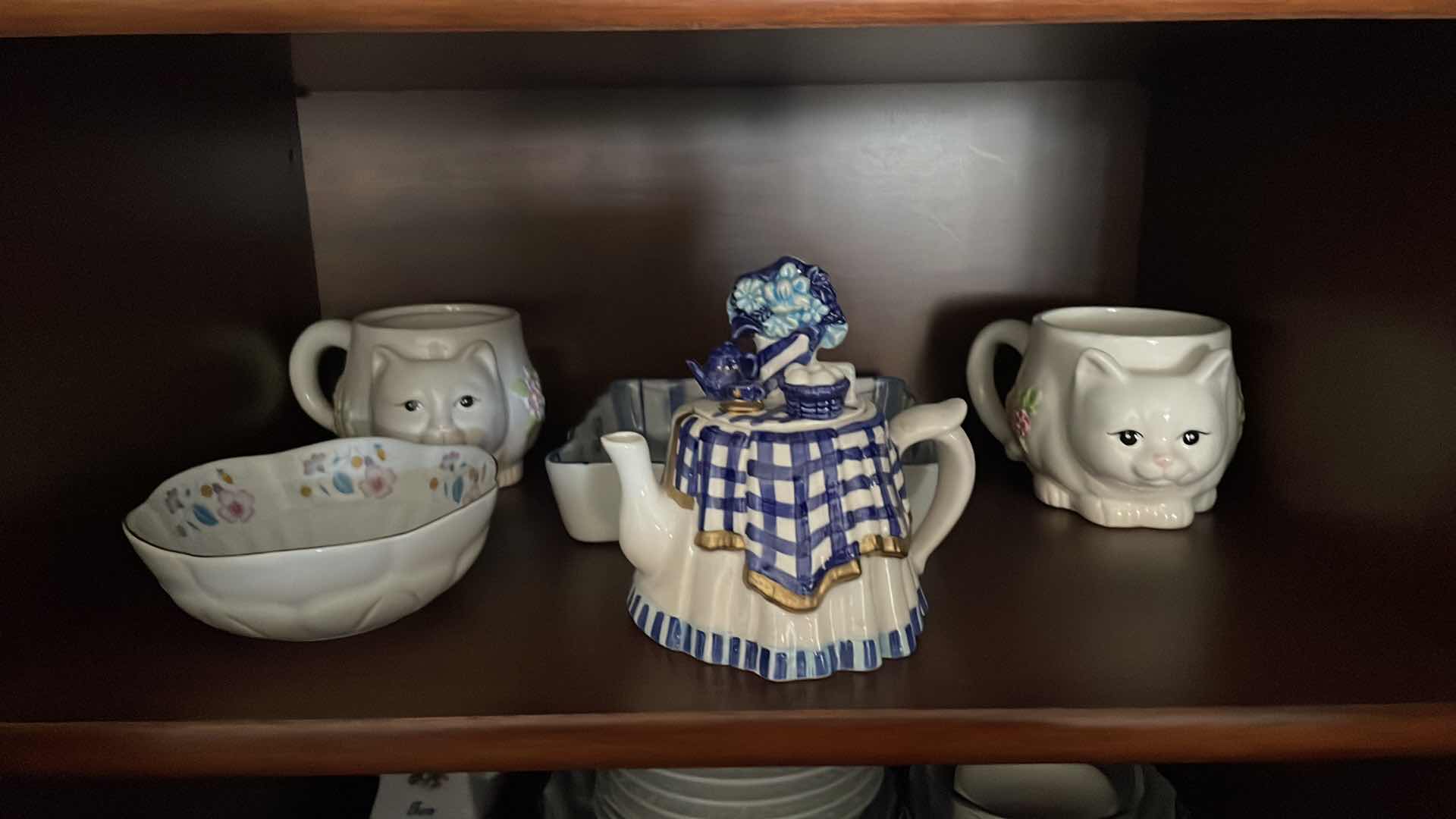 Photo 1 of CONTENTS OF CABINET LR