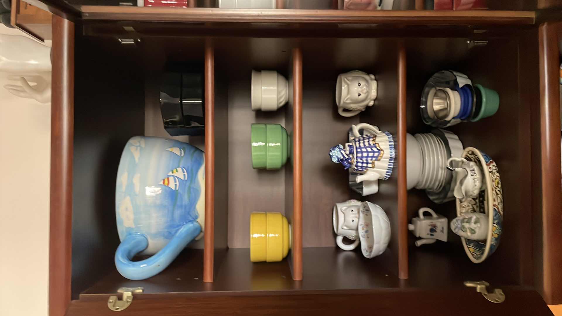 Photo 1 of CONTENTS OF CABINET LR