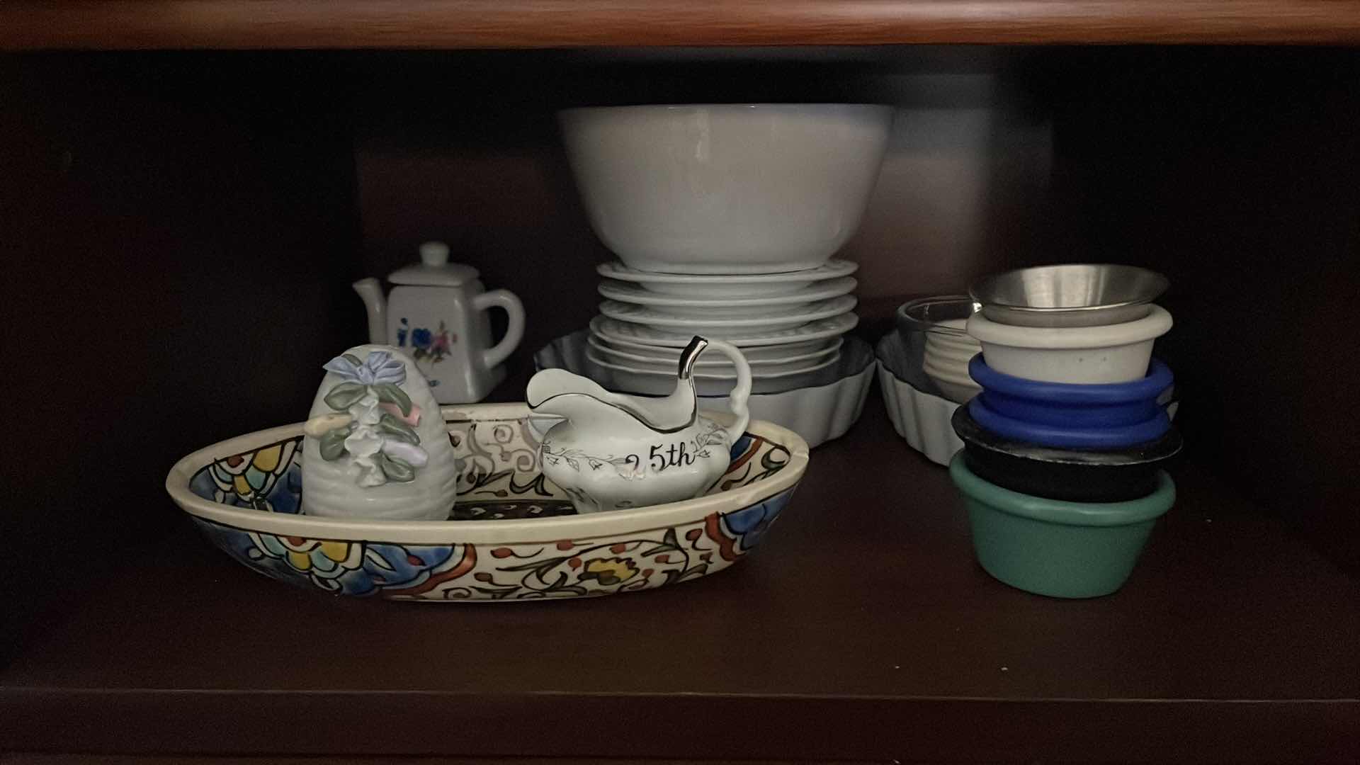 Photo 1 of CONTENTS OF CABINET LR